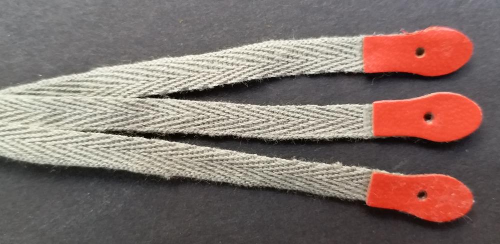 Upright action tapes, grey strip with red leather